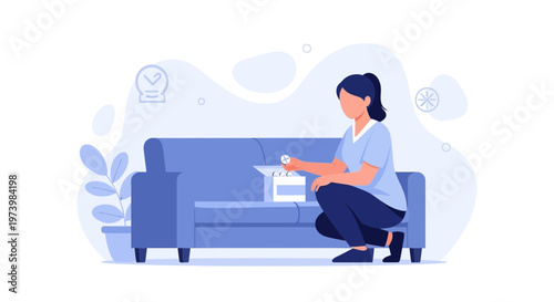 Woman tidying up living room, organizing items from a box next to a sofa.