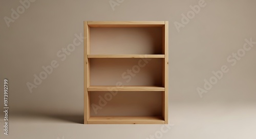 Minimalist wooden shelving unit with three compartments and neutral background