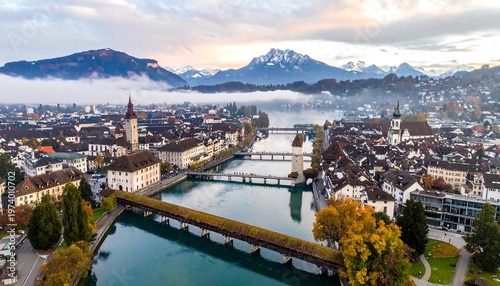 Aerial view of Lucerne, Switzerland, with mountains and river.