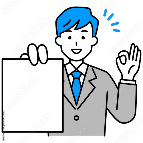 書類を見せてOKサインをするスーツの男性