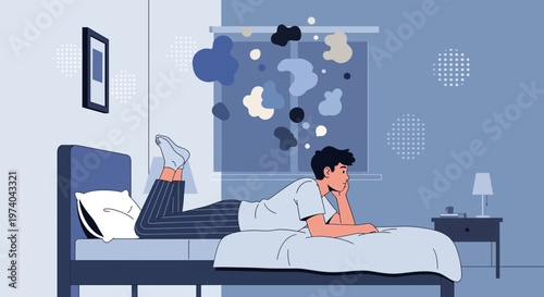Young man lying on bed, lost in thought, abstract shapes floating above