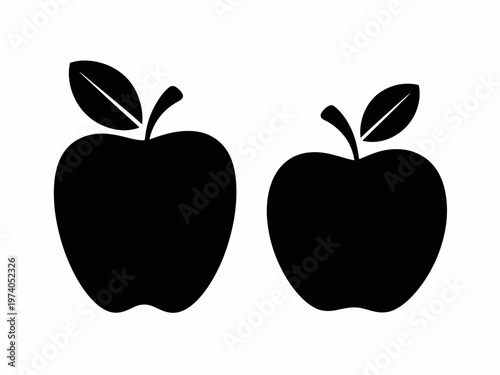 Two black and white apples with leaves on a plain background simple leaf