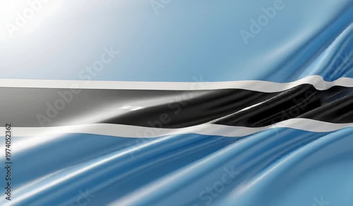 Waving flag of Botswana with its distinctive blue, black, and white stripes, representing the nation's identity and pride.