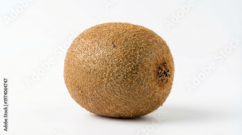 A close-up photo of a single kiwi fruit on a white background