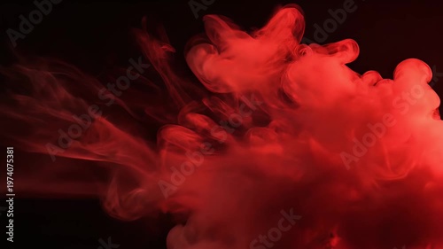 Abstract Red Smoke Cloud Explosion Against Black Background.