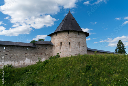 Izborsk Tower of the Holy Dormition Pskov-Pechersk Monastery on a sunny summer day, Pechory, Pskov region, Russia