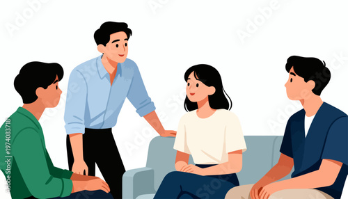 Four people sit together, sharing a conversation. Man stands, gesturing as he speaks with warmth. Woman listens attentively, smiling softly. Others lean in, engaged and thoughtful