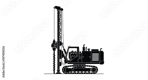 Black and white silhouette of a large drilling rig machine on tracks
