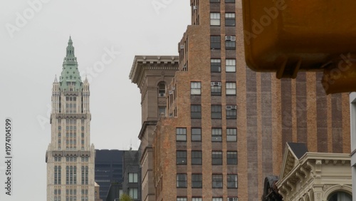 New York City Woolworth building 1913, skyscraper on Broadway in Downtown Financial District, Lower Manhattan, United States of America. Gothic historic architecture, green cooper roof from Soho, USA.