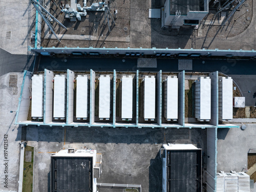 Aerial view of energy storage battery arrays in an industrial plant area