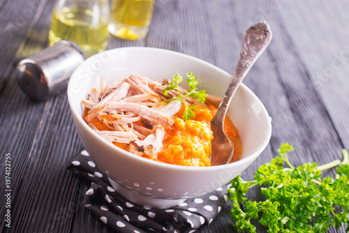 Creamy pumpkin soup with chicken