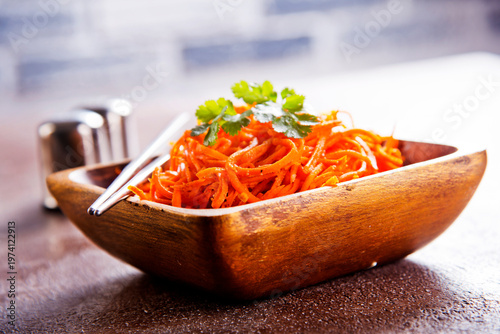 Carrot salad. French Grated Carrot Salad. Shredded carrot with garlic and black pepper