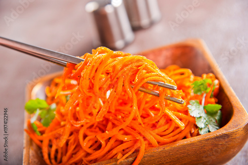 Carrot salad. French Grated Carrot Salad. Shredded carrot with garlic and black pepper