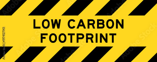 Yellow and black color with line striped label banner with word low carbon footprint