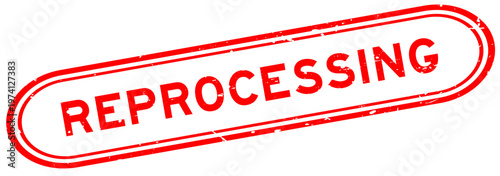 Grunge red reprocessing word rubber seal stamp on white background