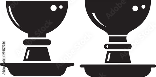 Two black silhouette icons of goblets on stands, symbolizing drinks or awards.
