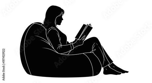 Silhouette of a woman relaxing in a large beanbag chair engrossed in reading a book conveying peace and quiet leisure