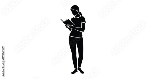 Woman intently reading a book depicted as a striking black silhouette