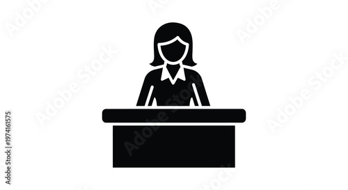 Woman presenting at a desk a striking black graphic silhouette
