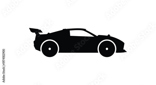 Black sports car with large rear wing a striking silhouette