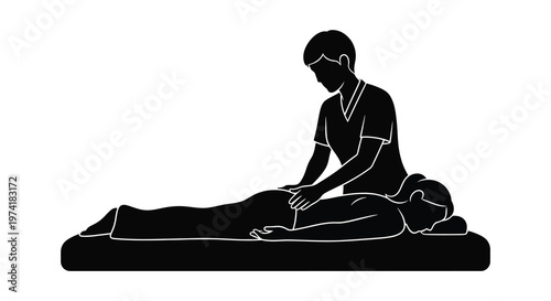 Massage therapist working on a patient depicted in stark silhouette