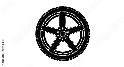Black alloy car wheel closeup.