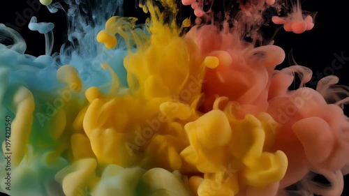 Vibrant clouds of blue, yellow, and red ink swirl and diffuse in dark water.