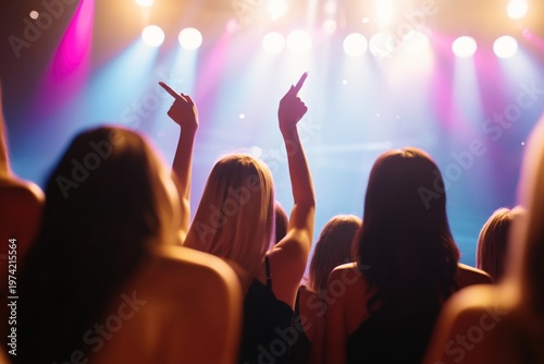 Excited Audience at Live Music Festival Concert with Bright Stage Lights, Fans Celebrating at Nightclub Event