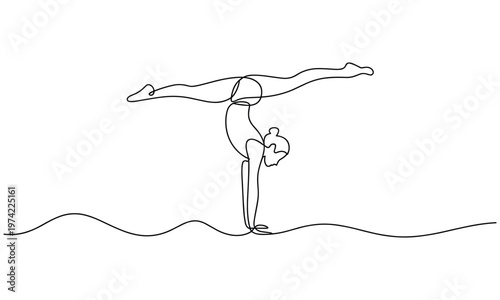 Agile gymnast performing an impressive handstand split pose with grace.