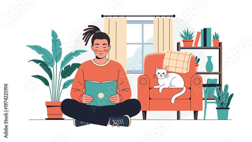 Person with dreadlocks sitting cross-legged on the floor and reading a book in a cozy living room with a cat on an armchair and plants.