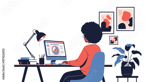 Businesswoman with afro hair working at a computer desk with books, a desk lamp, and potted plants in a home office.