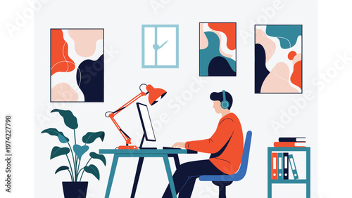 Creative professional wearing headphones while working at a computer in a modern home office decorated with colorful abstract art and indoor plants.