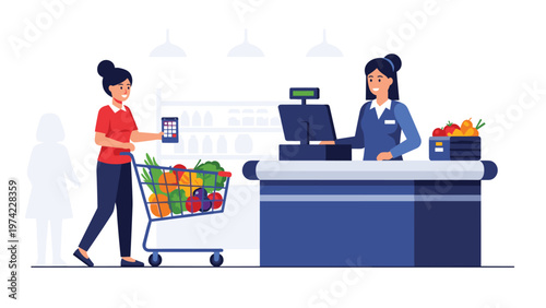 Active young woman pushing a shopping cart full of fresh vegetables and paying with a smartphone app at a supermarket checkout counter.