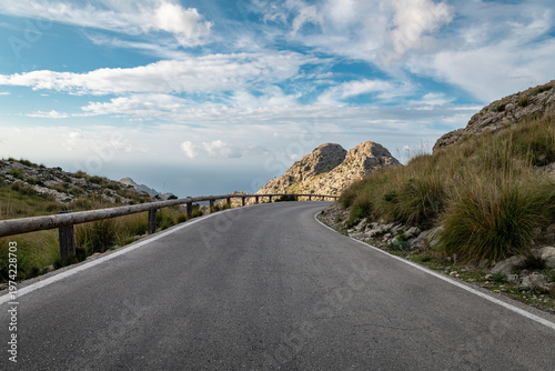 Empty road in mountains of Mallorca before sunset