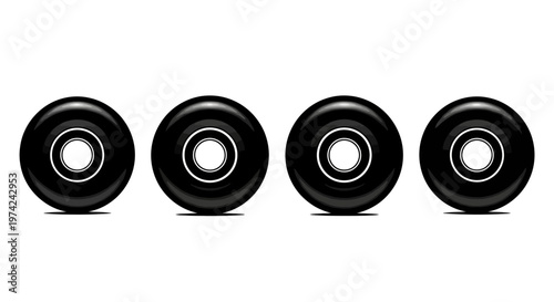Four black bowling balls lined up on white background