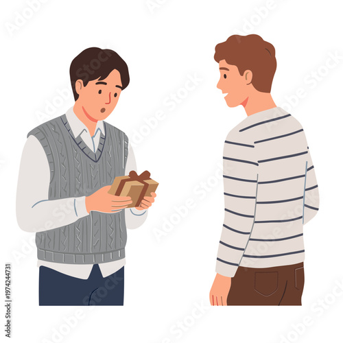 Two men interact with a gift in a casual conversation setting indoors.