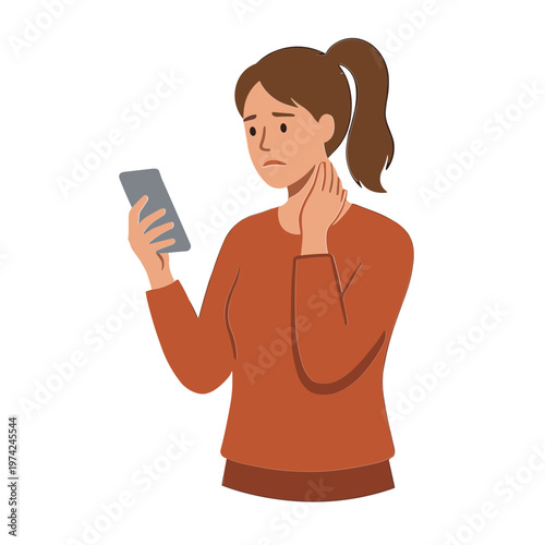 A woman looks concerned while checking her phone indoors.
