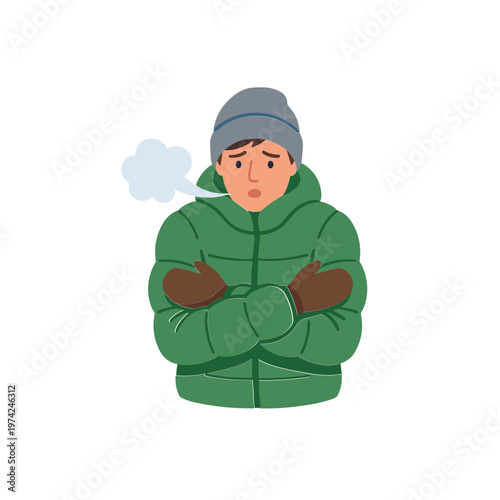 A man shivering in winter clothing stands alone outdoors