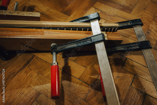Acoustic guitar repair with tools around it