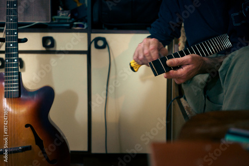 Luther services the acoustic guitar