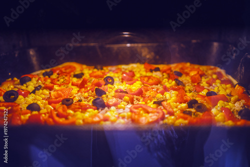 Homemade pizza with vegetables and fish