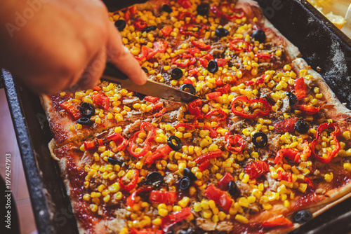 Homemade pizza with vegetables and fish