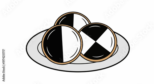 Three contrasting cookies with black and white icing arranged on a grey plate
