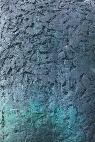 Close-up of a highly textured, dark blue and turguoise surface in summer, Muhu, Estonia, Europe.