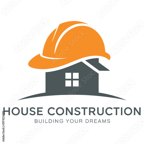 Construction worker helmet placed atop a house symbolizing house construction and dream building