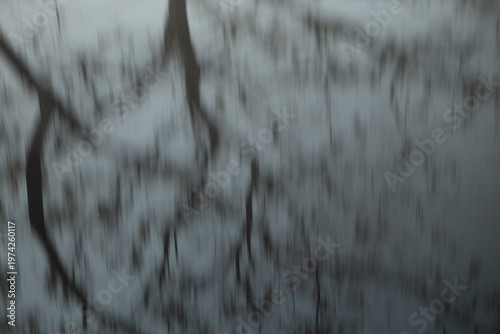 Person wearing protective mask in polluted city, highlighting toxic air, smog, respiratory risks, environmental problems, and importance of health protection awareness.
