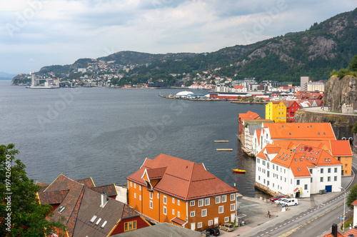 Historic harbour, Skutevik, charming wooden buildings, it is nasty day. Bergen, Norway.
