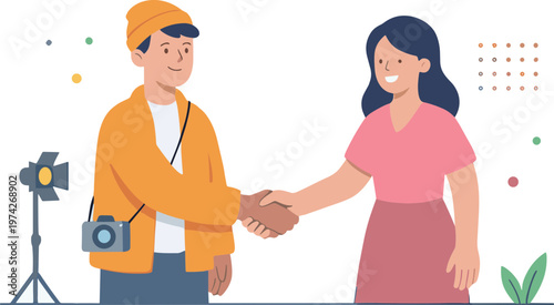 A photographer shakes hands with a smiling woman in an outdoor setting with a camera.