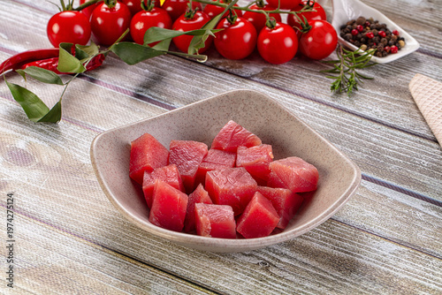 Bild auf Leinwand Raw tuna fish cubes heap