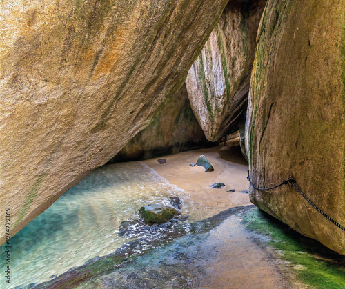 Photography A view along a large enclosed tidal pool in the Baths National Park, Virgin Gord
